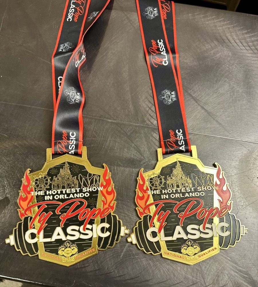 Two Ty Pope Classic medals